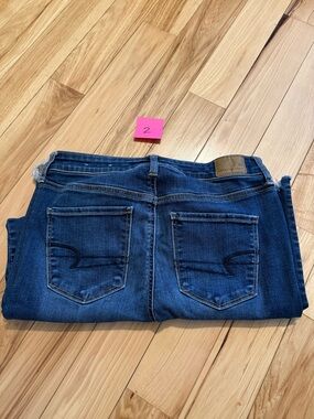 American Eagle Outfitters Dark Blue Skinny Jeans with Signature Back Pockets